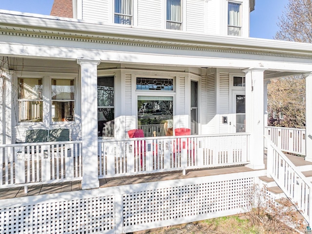 back of house with a porch
