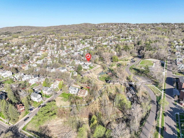 aerial overview of property's location with nearby suburban area