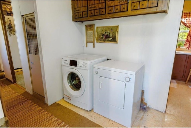 7262 Palo Tia Rd, Embarrass, MN 55732 - clothes washing area featuring cabinet space, washing machine and dryer, and a heating unit