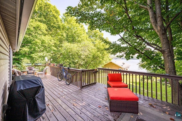 wooden deck with grilling area