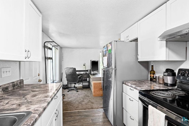 kitchen featuring electric range, white cabinetry, range hood, dark wood-type flooring, and a desk
