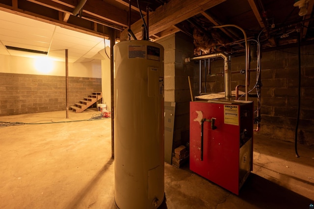 77 Solway Rd, Esko, MN 55733 - unfinished basement with water heater, a heating unit, and stairway