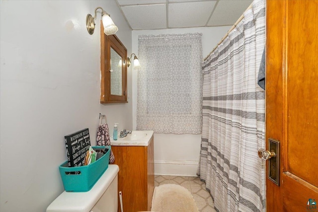 304 Carlton Ave, Cloquet, MN 55720 - bathroom with toilet, a shower with shower curtain, vanity, and tile patterned flooring