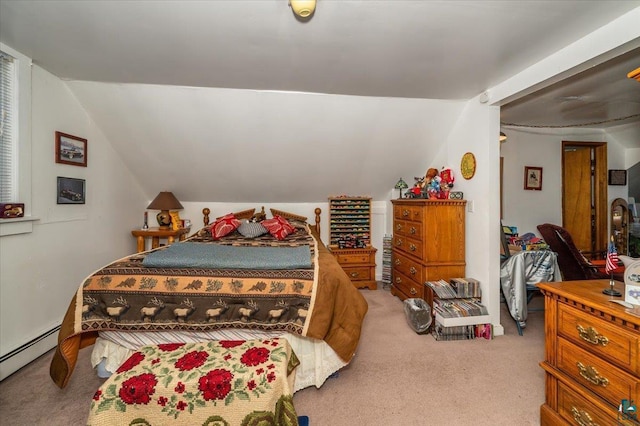 304 Carlton Ave, Cloquet, MN 55720 - carpeted bedroom featuring a baseboard radiator and vaulted ceiling