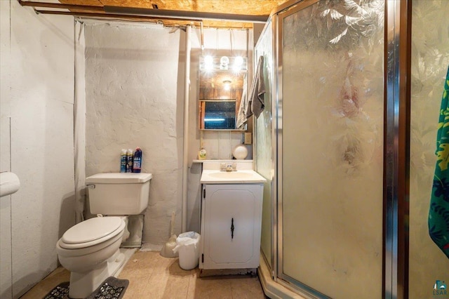 304 Carlton Ave, Cloquet, MN 55720 - bathroom featuring a stall shower, toilet, and vanity