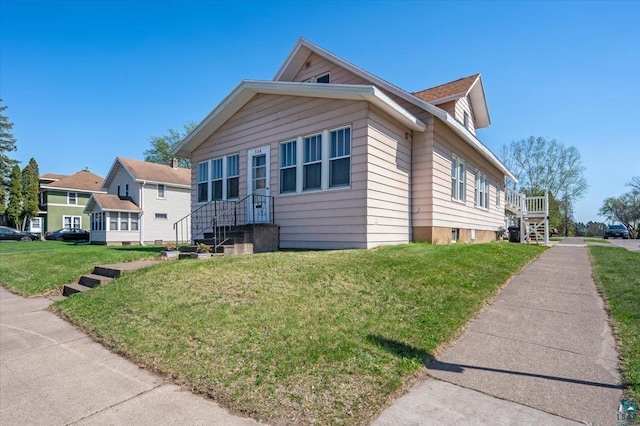 304 Carlton Ave, Cloquet, MN 55720 - view of front facade with a front yard
