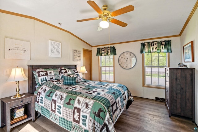10412 Lakeside Dr, Finlayson, MN 55735 - bedroom featuring vaulted ceiling, ornamental molding, multiple windows, wood finished floors, and ceiling fan
