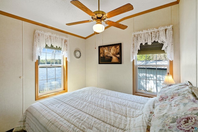 10412 Lakeside Dr, Finlayson, MN 55735 - bedroom featuring multiple windows, ornamental molding, vaulted ceiling, and a ceiling fan