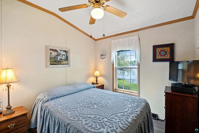10412 Lakeside Dr, Finlayson, MN 55735 - bedroom with lofted ceiling, ornamental molding, wood finished floors, and ceiling fan