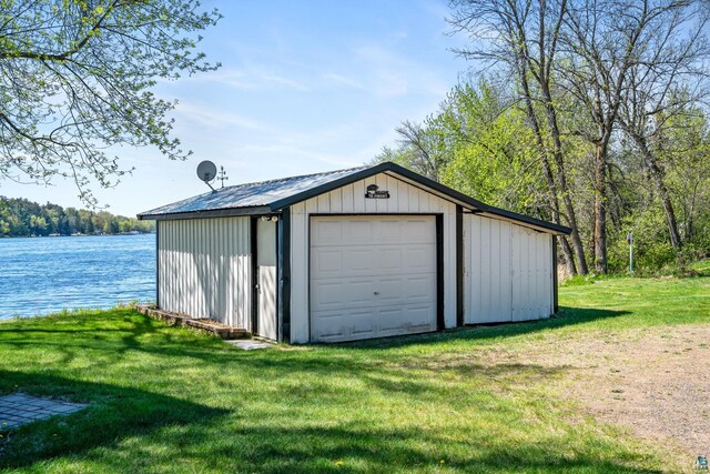 10412 Lakeside Dr, Finlayson, MN 55735 - detached garage featuring a water view and a wooded view