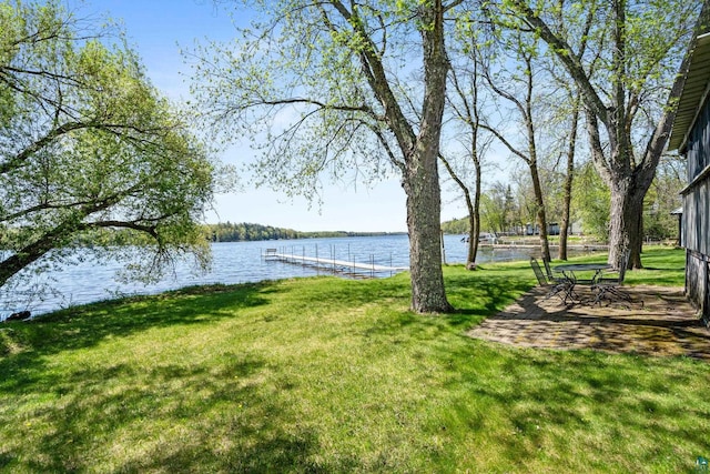 10412 Lakeside Dr, Finlayson, MN 55735 - view of green lawn featuring a water view and a boat dock