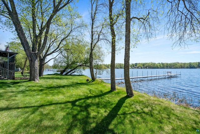 10412 Lakeside Dr, Finlayson, MN 55735 - view of grassy yard with a boat dock and a water view