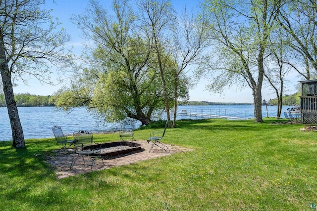 10412 Lakeside Dr, Finlayson, MN 55735 - view of grassy yard featuring a water view and a fire pit