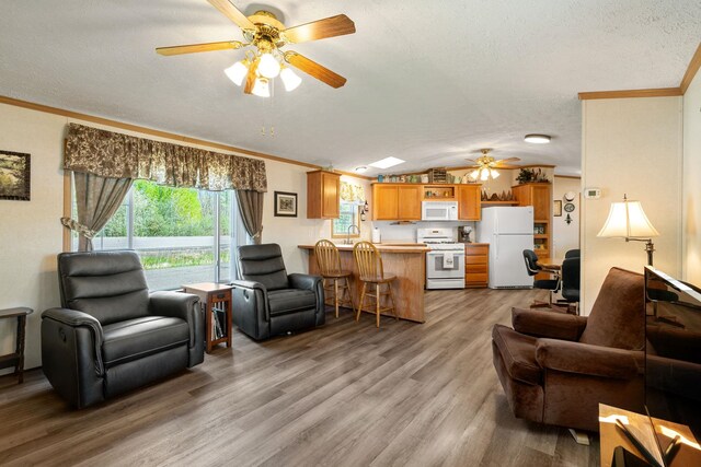 10412 Lakeside Dr, Finlayson, MN 55735 - living area with a ceiling fan, light wood-style flooring, crown molding, a textured ceiling, and vaulted ceiling
