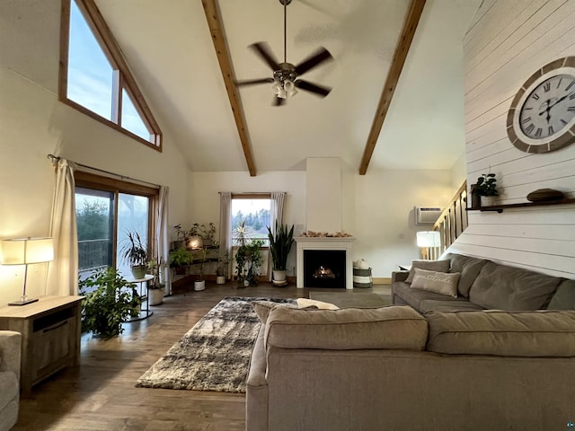 7789 Jokela Rd, Cloquet, MN 55720 - living room featuring high vaulted ceiling, a ceiling fan, wood finished floors, beam ceiling, and stairway