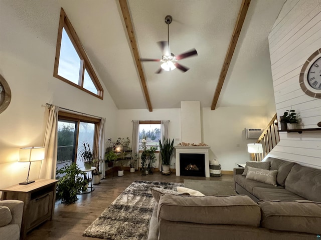 7789 Jokela Rd, Cloquet, MN 55720 - living room with high vaulted ceiling, a ceiling fan, beam ceiling, wood finished floors, and stairs