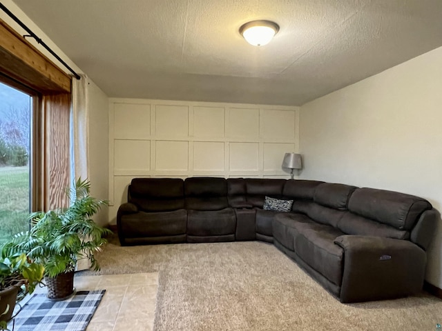 7789 Jokela Rd, Cloquet, MN 55720 - living room featuring carpet floors and a textured ceiling