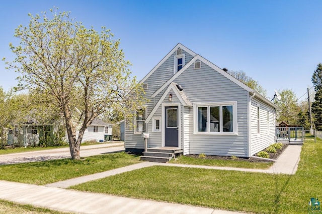426 22nd St, Cloquet, MN 55720 - view of front of house with a front lawn
