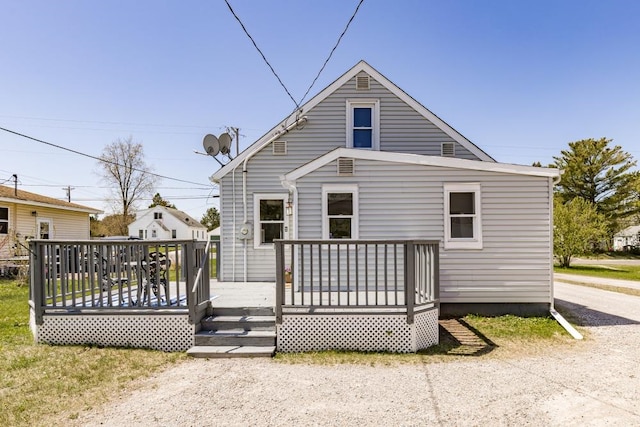 426 22nd St, Cloquet, MN 55720 - rear view of house featuring a wooden deck
