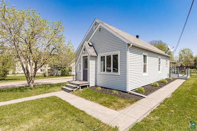 426 22nd St, Cloquet, MN 55720 - view of front of home with a front lawn