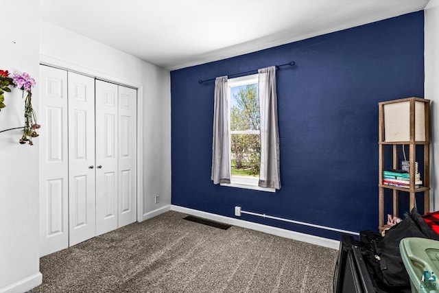 426 22nd St, Cloquet, MN 55720 - carpeted bedroom with baseboards and a closet