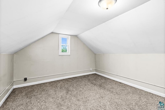 426 22nd St, Cloquet, MN 55720 - additional living space featuring carpet floors, lofted ceiling, and baseboards