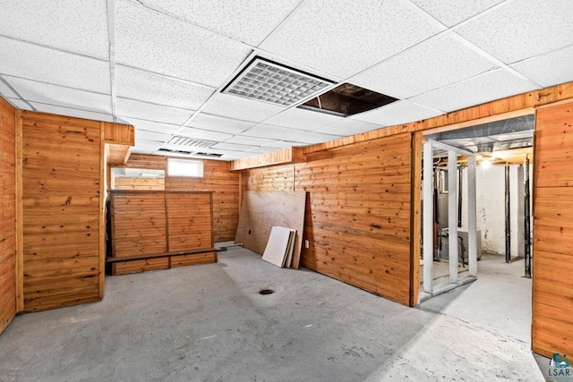 426 22nd St, Cloquet, MN 55720 - basement with wood walls and a paneled ceiling