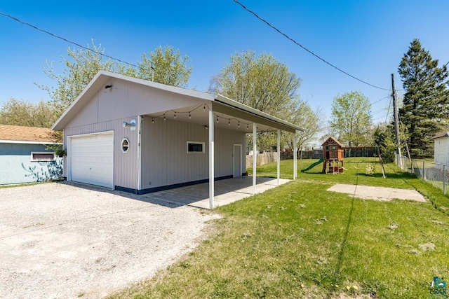 426 22nd St, Cloquet, MN 55720 - garage with a detached garage and gravel driveway