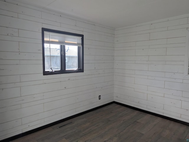 81 Edison Blvd, Silver Bay, MN 55614 - spare room with dark wood-style flooring and baseboards