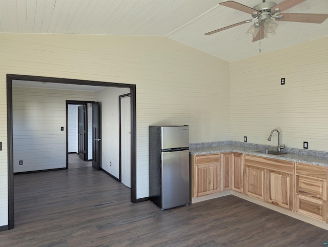 81 Edison Blvd, Silver Bay, MN 55614 - kitchen featuring freestanding refrigerator, a sink, lofted ceiling, light brown cabinetry, and dark wood-type flooring