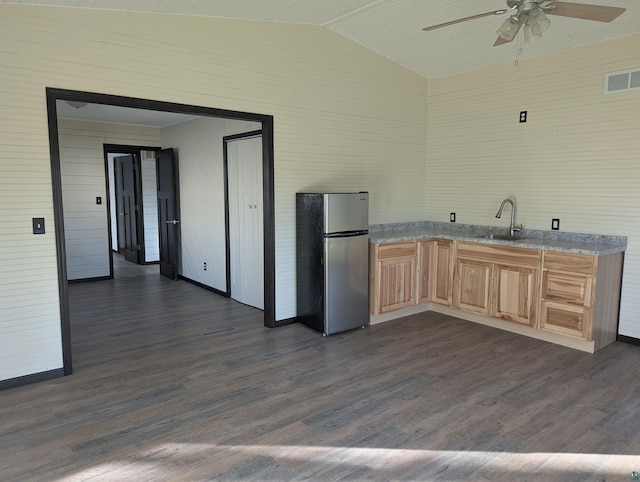 81 Edison Blvd, Silver Bay, MN 55614 - kitchen featuring freestanding refrigerator, light brown cabinetry, a ceiling fan, a sink, and vaulted ceiling