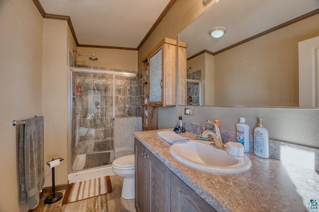 10173 Little Marais Trl, Silver Bay, MN 55614 - bathroom with ornamental molding, a shower stall, vanity, and toilet