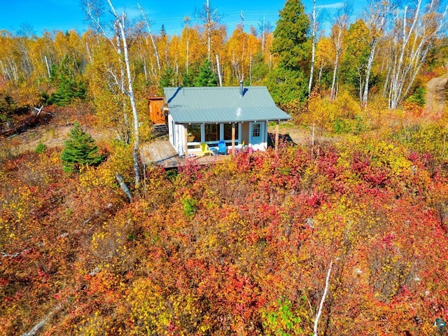 10173 Little Marais Trl, Silver Bay, MN 55614 - view of front of property with metal roof and a view of trees