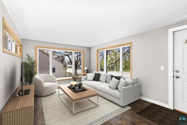 2106 Piedmont Ave, Duluth, MN 55811 - living room featuring dark wood-style flooring and baseboards