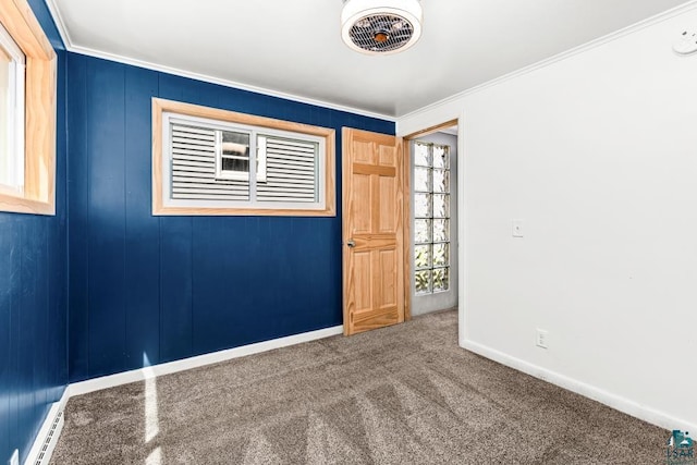 2106 Piedmont Ave, Duluth, MN 55811 - empty room featuring a baseboard radiator, baseboards, carpet floors, and ornamental molding