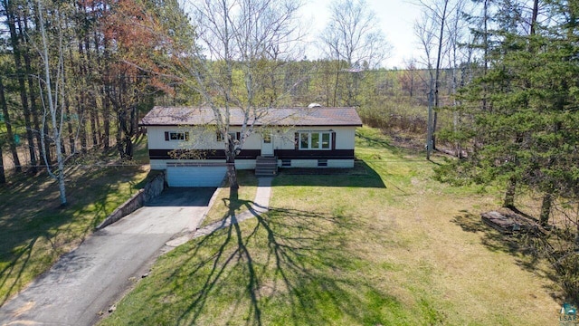 4538 Bass Lake Rd, Gilbert, MN 55741 - view of front of home featuring driveway, a garage, and a front lawn