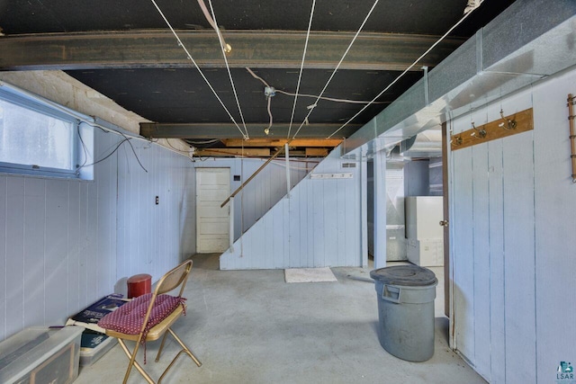 4538 Bass Lake Rd, Gilbert, MN 55741 - basement featuring stairs and wooden walls