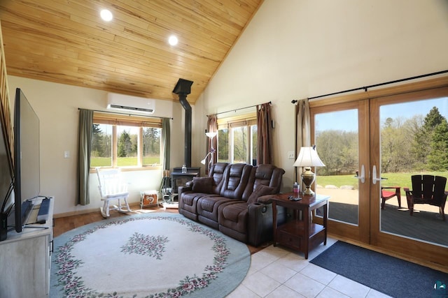 10362 Arkola Rd, Meadowlands, MN 55765 - living area featuring a wood stove, french doors, a wall mounted AC, wooden ceiling, and high vaulted ceiling