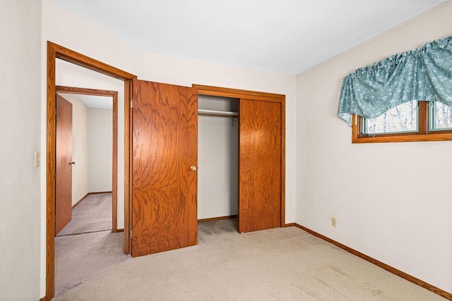 3026 Getchell Rd, Duluth, MN 55810 - unfurnished bedroom featuring carpet floors, baseboards, and a closet