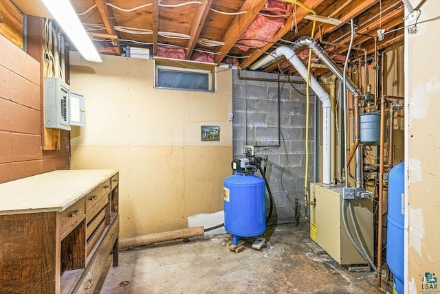 3026 Getchell Rd, Duluth, MN 55810 - unfinished basement with a water pressure tank, concrete block wall, and a heating unit