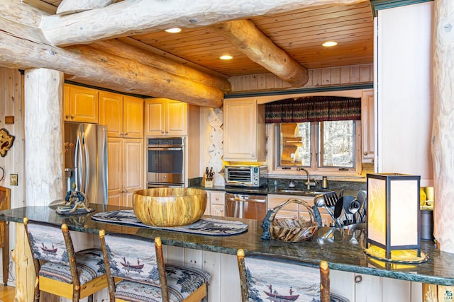 693 Kawishiwi Trl, Ely, MN 55731 - kitchen with appliances with stainless steel finishes, a sink, wood ceiling, beam ceiling, and recessed lighting