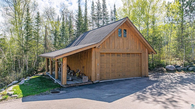 693 Kawishiwi Trl, Ely, MN 55731 - detached garage with a forest view