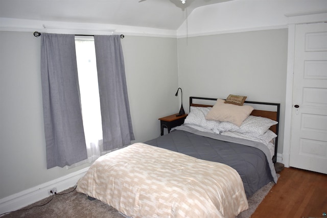 bedroom with vaulted ceiling