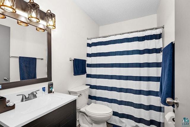 733 13th Ave, Two Harbors, MN 55616 - bathroom with a textured ceiling, toilet, vanity, and curtained shower