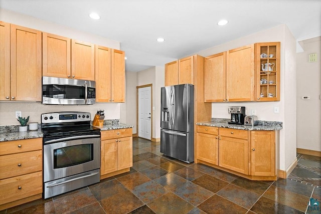 203 S 2nd Ave, Proctor, MN 55810 - kitchen featuring stainless steel appliances, dark stone finish floors, glass insert cabinets, baseboards, and recessed lighting