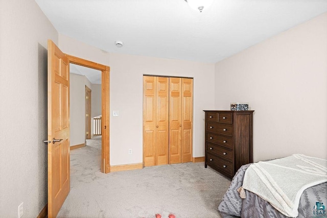 203 S 2nd Ave, Proctor, MN 55810 - bedroom featuring carpet floors, a closet, and baseboards