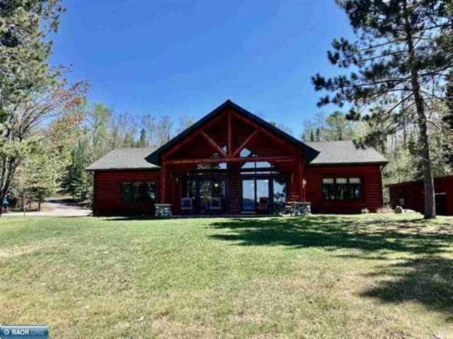 3622 Wildgate Rd, Ely, MN 55731 - rear view of house featuring a lawn
