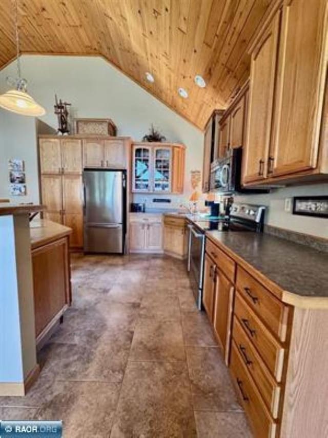 3622 Wildgate Rd, Ely, MN 55731 - kitchen featuring appliances with stainless steel finishes, wooden ceiling, lofted ceiling, dark countertops, and glass insert cabinets