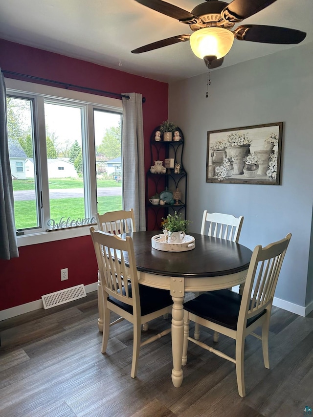 706 28th St, Cloquet, MN 55720 - dining space with wood finished floors, baseboards, and a ceiling fan