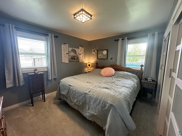 706 28th St, Cloquet, MN 55720 - carpeted bedroom with a closet and baseboards